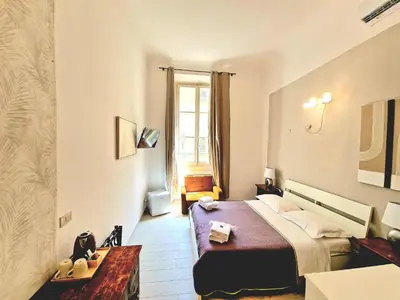 Letto o letti in una camera di Locanda Pitti