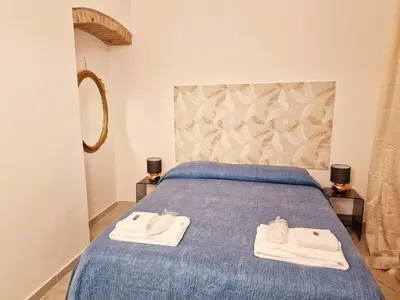 Letto o letti in una camera di Locanda Pitti