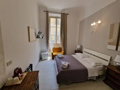 Letto o letti in una camera di Locanda Pitti