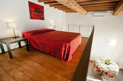 Letto o letti in una camera di Art Apartment Santo Spirito Matteo