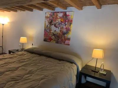Letto o letti in una camera di Art Apartment Santo Spirito Matteo