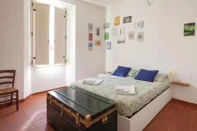 Letto o letti in una camera di Appartamento 122