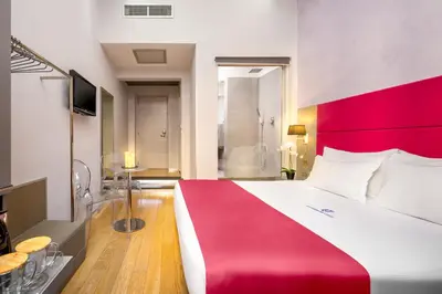 Letto o letti in una camera di Le Camere Dei Conti - Rooms