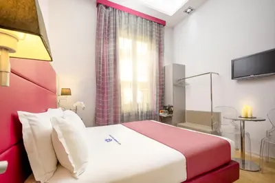 Letto o letti in una camera di Le Camere Dei Conti - Rooms