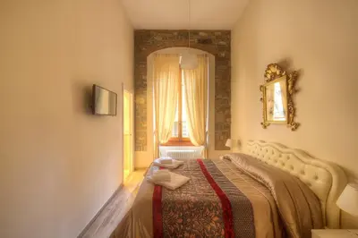 Letto o letti in una camera di DUOMO LUXURY APARTMENT 