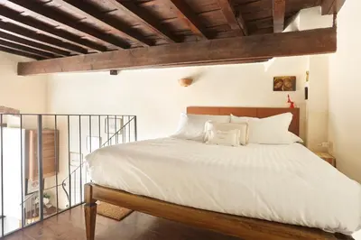 Letto o letti in una camera di Lambertesca il Cuore di Firenze