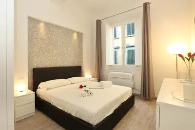 Letto o letti in una camera di Cristina Suite