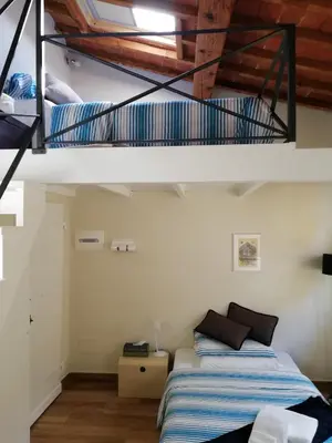 Letto o letti in una camera di Casa Allegri