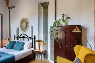 Letto o letti in una camera di Palazzo Della Nave
