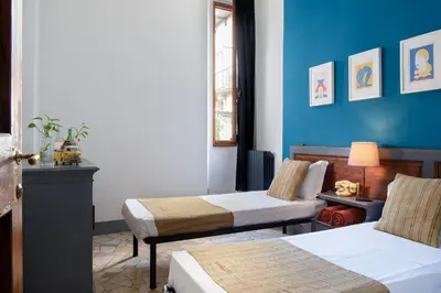 Letto o letti in una camera di Palazzo Della Nave