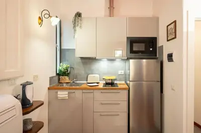 Cucina o angolo cottura di Pitti - Flo Apartments charme su Piazza Pitti