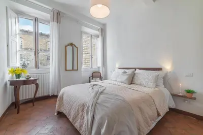 Letto o letti in una camera di Pitti - Flo Apartments charme su Piazza Pitti