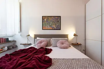 Letto o letti in una camera di Pitti - Flo Apartments charme su Piazza Pitti