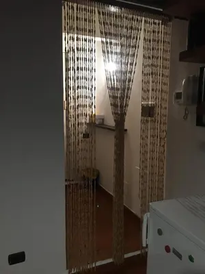 Letto o letti in una camera di Il nido di Sofia