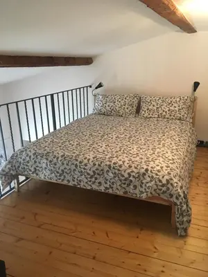 Letto o letti in una camera di Il nido di Sofia