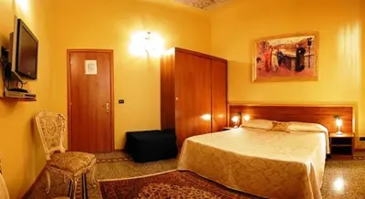 Letto o letti in una camera di La Luna Guest House