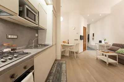 Cucina o angolo cottura di Keys of Italy - Pergola 19 - 1 Bdr Flat with inner courtyard