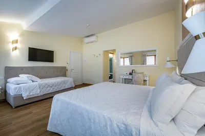 Letto o letti in una camera di Residenza Alessandra