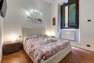 Letto o letti in una camera di Geppi's Apartments