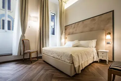 Letto o letti in una camera di Residenza Delle Arti