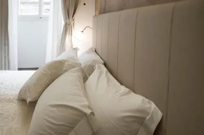 Letto o letti in una camera di Residenza Delle Arti