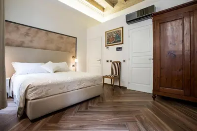 Letto o letti in una camera di Residenza Delle Arti