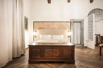 Letto o letti in una camera di Residenza Delle Arti
