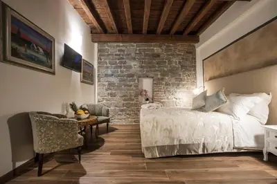 Letto o letti in una camera di Residenza Delle Arti