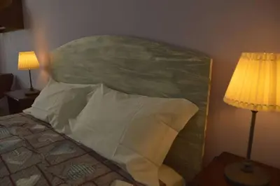Letto o letti in una camera di Raggio di Sole