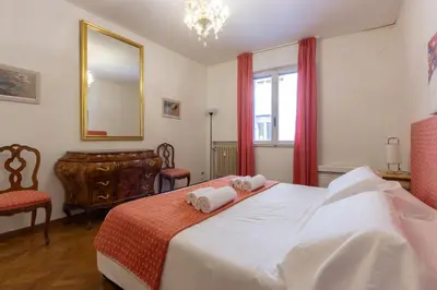 Letto o letti in una camera di Casa Savioli
