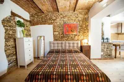 Letto o letti in una camera di Le Rose Casa della Ciri