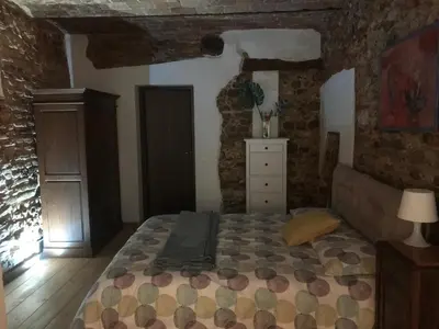Letto o letti in una camera di Le Rose Casa della Ciri