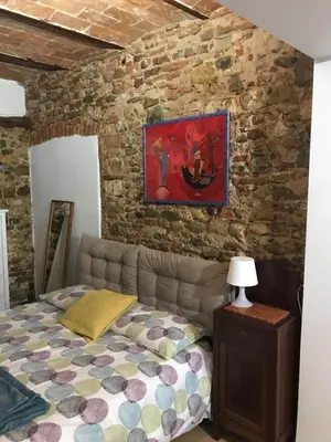 Letto o letti in una camera di Le Rose Casa della Ciri