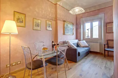 Area soggiorno di Romantic apartment in the heart of Florence