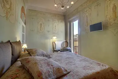 Letto o letti in una camera di Romantic apartment in the heart of Florence