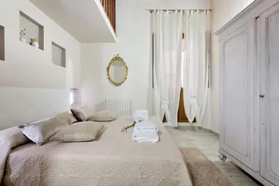Letto o letti in una camera di Santa Croce Cathedral by Mmega