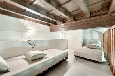 Letto o letti in una camera di Santa Croce Cathedral by Mmega