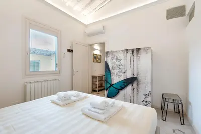 Letto o letti in una camera di Giglio Oro by Mmega