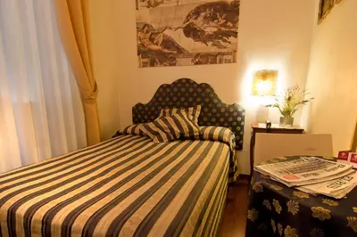 Letto o letti in una camera di Florence Room B&B