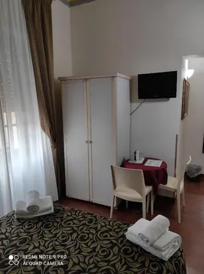 TV o dispositivi per l'intrattenimento presso Florence Room B&B