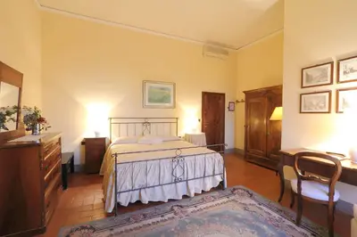 Letto o letti in una camera di Villa Il Colle B&B