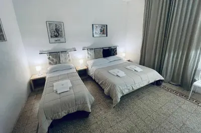 Letto o letti in una camera di Celso Otto
