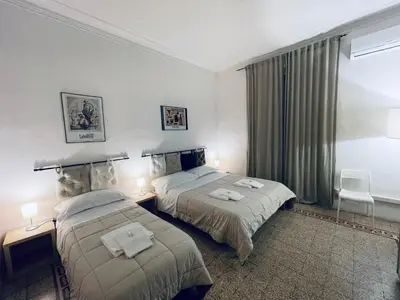 Letto o letti in una camera di Celso Otto