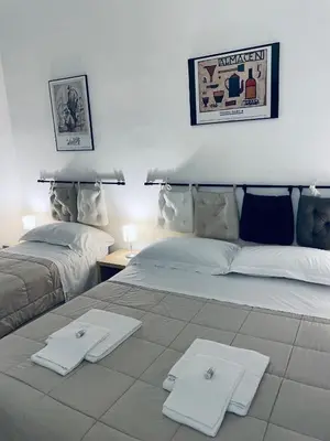 Letto o letti in una camera di Celso Otto