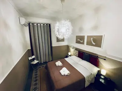 Letto o letti in una camera di Celso Otto