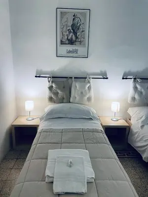 Letto o letti in una camera di Celso Otto