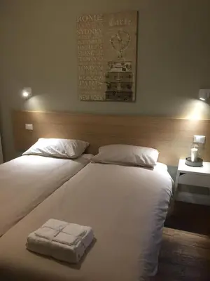 Letto o letti in una camera di Leon Rosso Flat