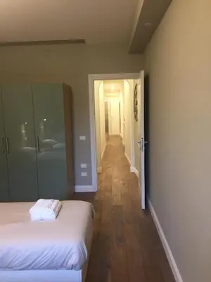 Letto o letti in una camera di Leon Rosso Flat