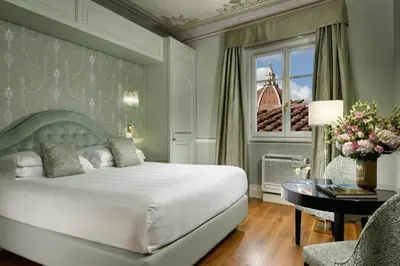 Letto o letti in una camera di San Firenze Suites & Spa