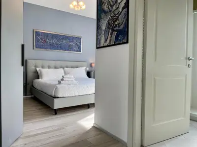 Letto o letti in una camera di Borgo Guelfo VIII